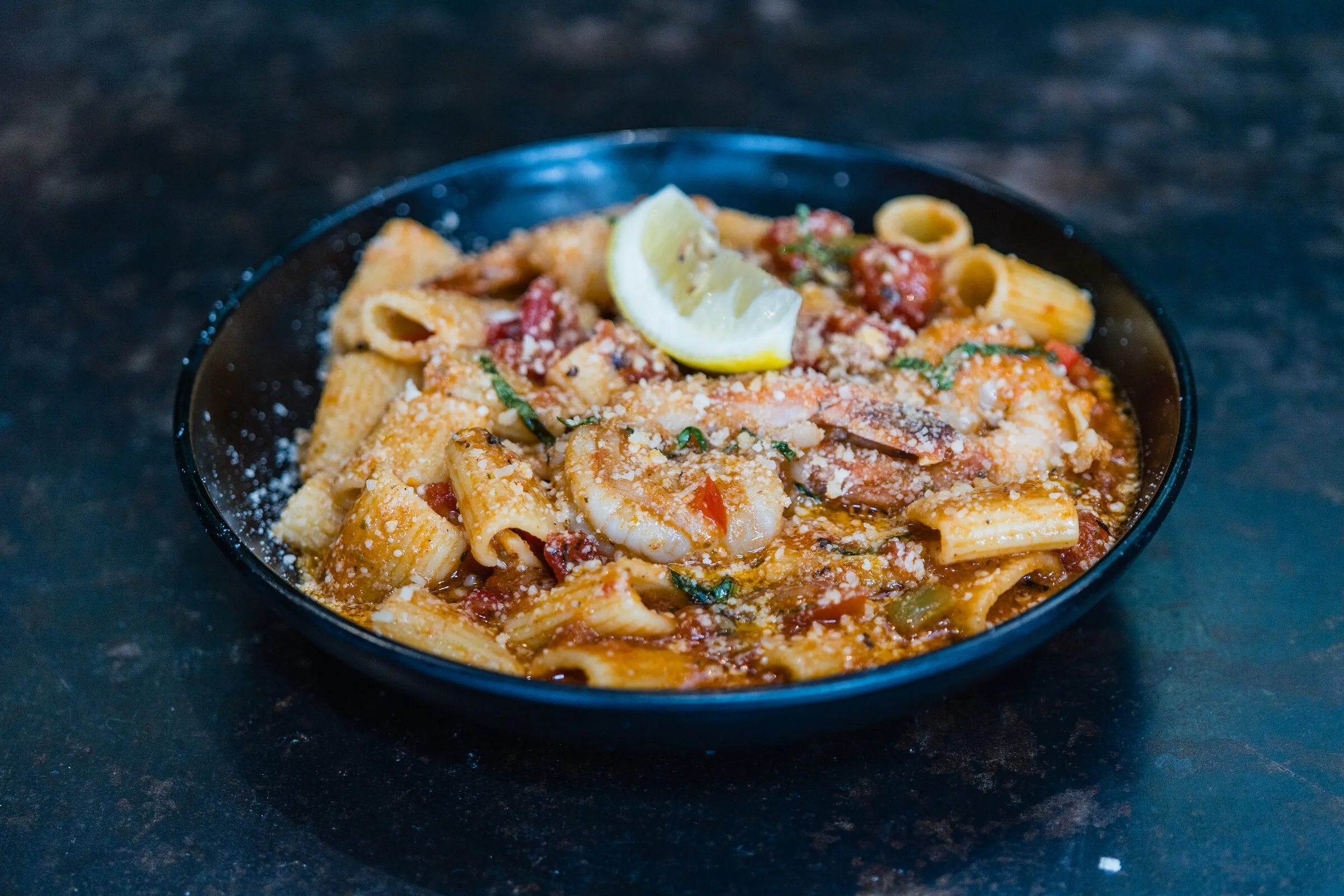 Creole Shrimp Pasta — Gulf shrimp, rigatoni, roasted tomato, basil cream at Louisiana Purchase