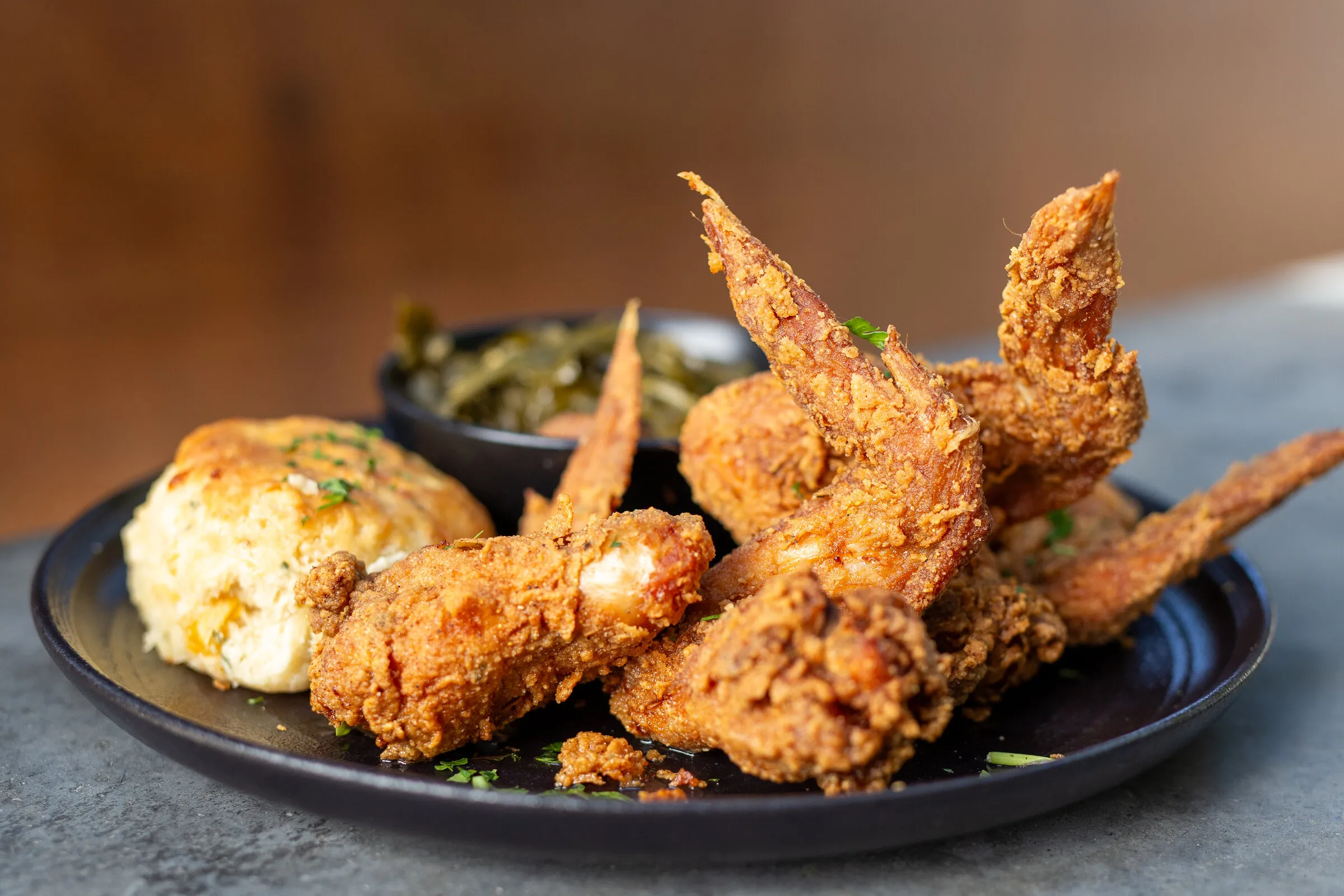 Dooky Chase — fried chicken wings, biscuit, and a side at Louisiana Purchase, in honor of Mrs. Leah Chase