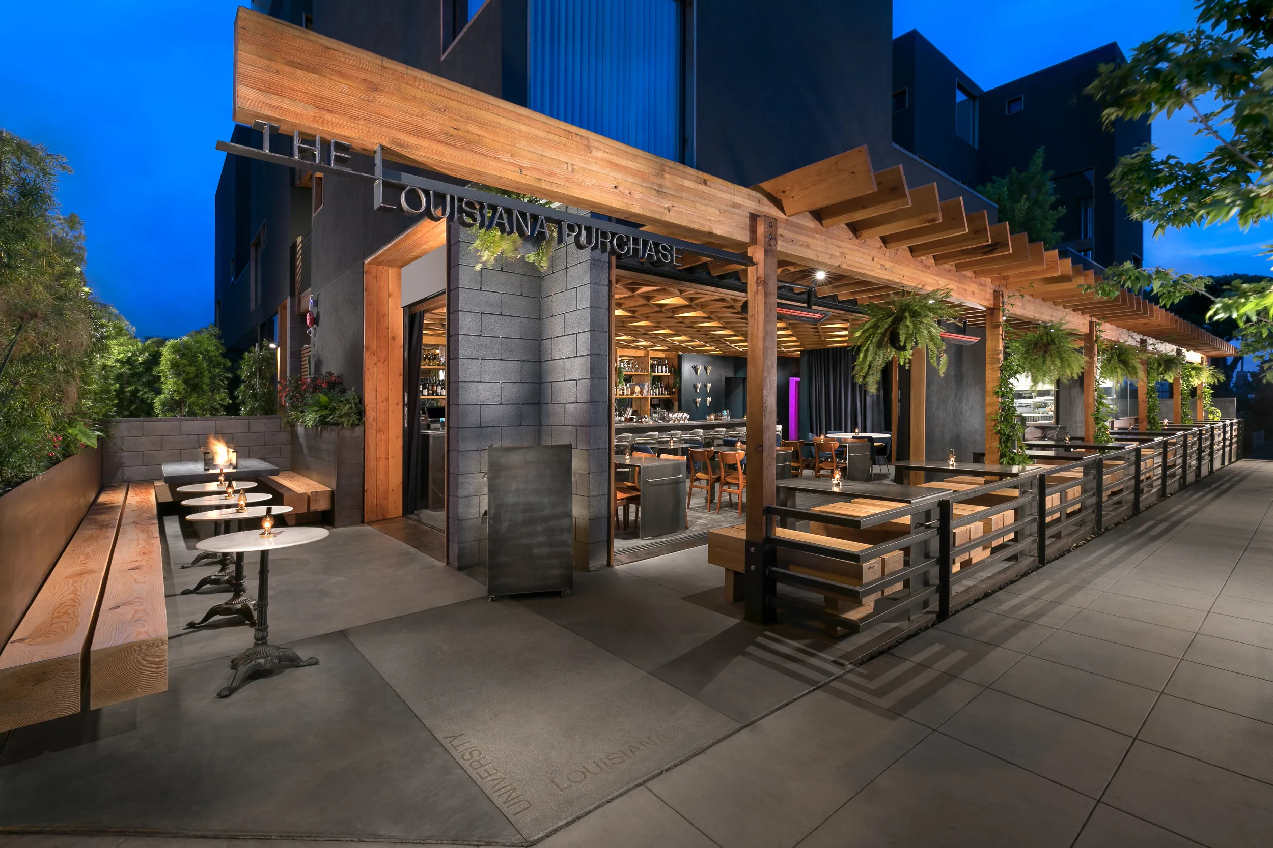 Louisiana Purchase exterior at twilight — patio and pergola, North Park, San Diego